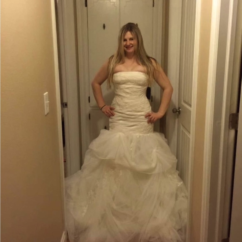 Simply Vera by Vera Wang wedding dress with tags.
